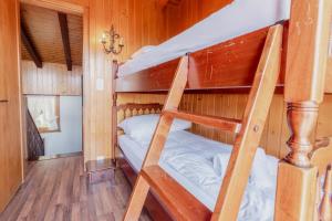 Кровать или кровати в номере Magnifique chalet mitoyen avec vue sur les montagnes