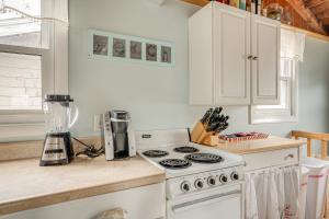 A kitchen or kitchenette at Rockport Cottage with Patio - Steps to Beach!