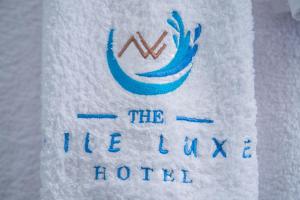 Un certificat, premiu, logo sau alt document afișat la Nile Luxe Hotel