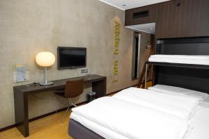 Comfort Hotel Kristiansand 객실 침대