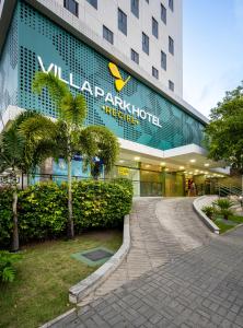 レシフェにあるVilla Park Hotel Recife - Antigo Villa dOro Hotelの看板付きの建物