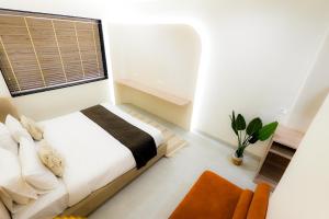 Katil atau katil-katil dalam bilik di Hotel Elinor By Dazzling Hotels & Resorts