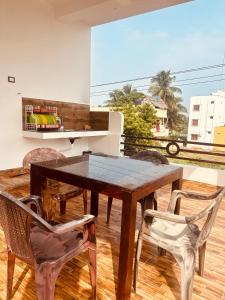 Un balcón o terraza en De villa Breeze Beach Inn