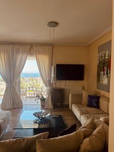 Гостиная зона в Sea View House Voula