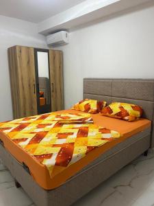 A bed or beds in a room at Kan&Dzan Apartmani