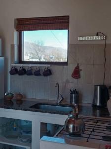 Una cocina o cocineta en Entre Montañas