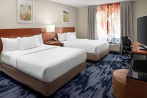 Lova arba lovos apgyvendinimo įstaigoje Fairfield Inn & Suites by Marriott Rehoboth Beach