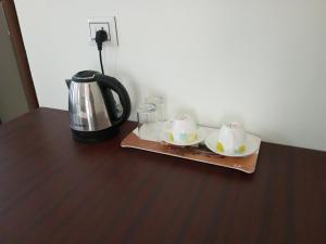 Kemudahan buat kopi dan teh di CHAEL Airport Residency,Nedumbassery Cochin