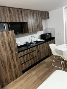 Nhà bếp/bếp nhỏ tại Montevideo Cordón Apartamentos-Uruguay