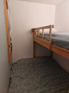 Llit o llits en una habitació de appartement aux coches 6-8 personnes 1 chambre 23m2