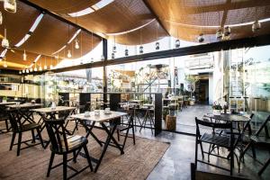 Um restaurante ou outro lugar para comer em The Hat Madrid