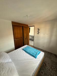 Apartamento Colibrí Jardín में एक कमरे में एक या कई बेड