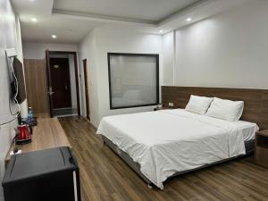 Phuong Mai Hotel में एक कमरे में एक या कई बेड