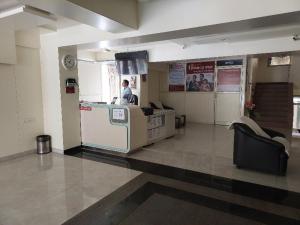 Fuajee või vastuvõtt majutusasutuses Super Hotel O Happy Homely Stay Near Pune Airport