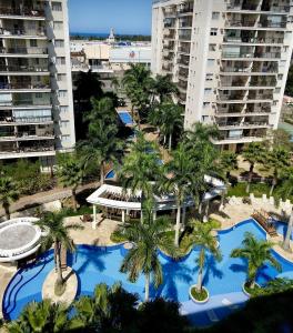 The swimming pool at or close to Barra Family com piscina e spa, 2 quartos