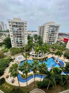 The swimming pool at or close to Barra Family com piscina e spa, 2 quartos