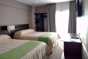 Katil atau katil-katil dalam bilik di Days Inn & Suites by Wyndham La Plata