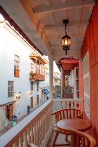 A balcony or terrace at Casa Noa Colonial Rooms