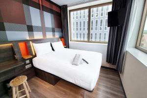 Voodi või voodid majutusasutuse easyHotel Paris Nord Aubervilliers toas