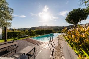 The swimming pool at or close to Quinta Da Mouta