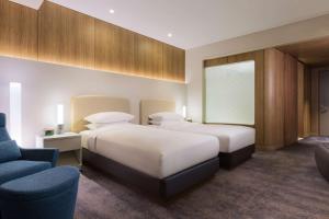 Cama ou camas em um quarto em Grand Hyatt Incheon