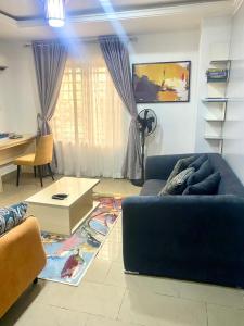 Area tempat duduk di One bedroom suite Lifecamp