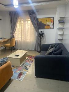 Area tempat duduk di One bedroom suite Lifecamp