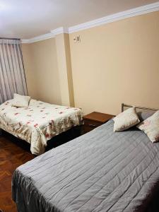 Giường trong phòng chung tại Hostel Buen descanso