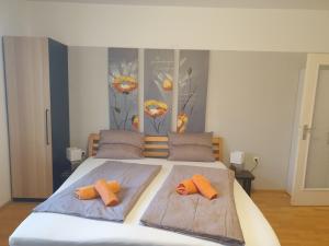 Rúm í herbergi á "Wohlfühl-Oase im Zentrum von Villach-1 Zimmer, Apartment , Garconniere Villach City