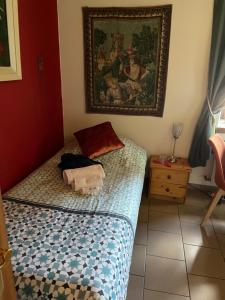 A bed or beds in a room at B&B Forêt d'Animaux