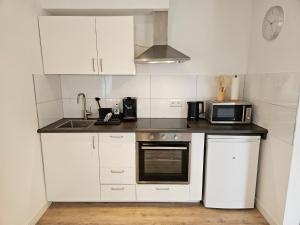 Apartment mit Jacuzzi Enschede 10km 주방 또는 간이 주방