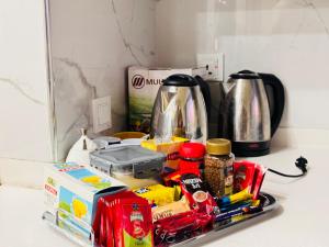 Coffee and tea making facilities at Gold Crest Signature Luxury Apartments DHA Lahore