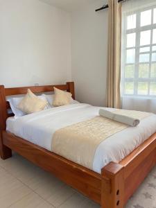 Кровать или кровати в номере Villa in Karagita near lake Naivasha resort