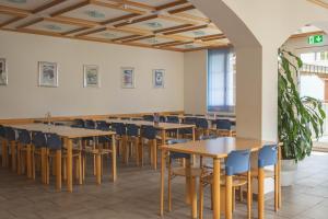 A restaurant or other place to eat at Engelberg Youth Hostel