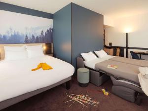 Novotel Annemasse Centre - Porte de Genève 객실 침대