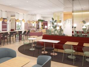 Um restaurante ou outro lugar para comer em Ibis Styles Strasbourg Centre République