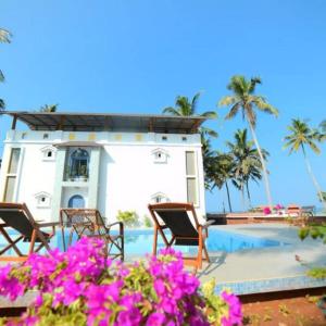 Сад в Magnolia Guesthouse Varkala