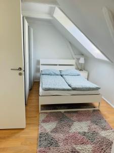 Cama ou camas em um quarto em Cozy 2-room Apartment