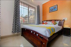 Llit o llits en una habitació de Hill view 2bhk coorg