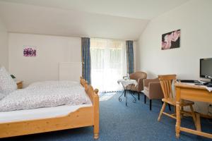 A bed or beds in a room at Köhler's Hof