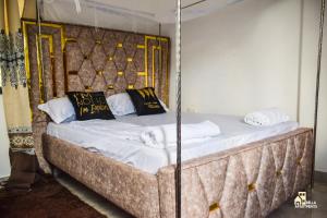 Voodi või voodid majutusasutuse Bella Accomodations, Mombasa toas