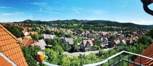 a view of a city from a building at Apartments Villa-Ratskopf Wernigerode in Wernigerode