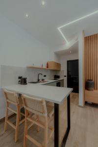 A kitchen or kitchenette at NIAMA Luxury apartments Nafplio