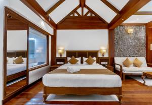 Cama ou camas em um quarto em Le Montfort Resort