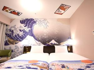 Voodi või voodid majutusasutuse Smile Hotel Premium Kanazawa Higashiguchiekimae toas