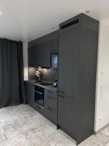 Majoituspaikan Stylisches City-Apartment keittiö tai keittotila