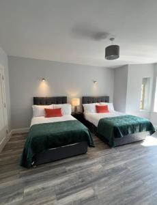 Lova arba lovos apgyvendinimo įstaigoje Luxury Guest house Claremorris