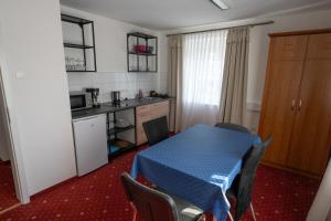 Kuhinja oz. manjša kuhinja v nastanitvi Komfort Apartmenthaus Haslbach FGZ