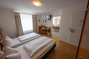 Postelja oz. postelje v sobi nastanitve Komfort Apartmenthaus Haslbach FGZ