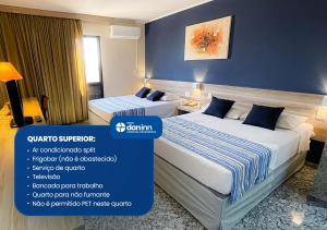 um quarto de hotel com duas camas num quarto em Hotel Dan Inn Campinas Anhanguera - Melhor Localização e Custo Benefício em Campinas